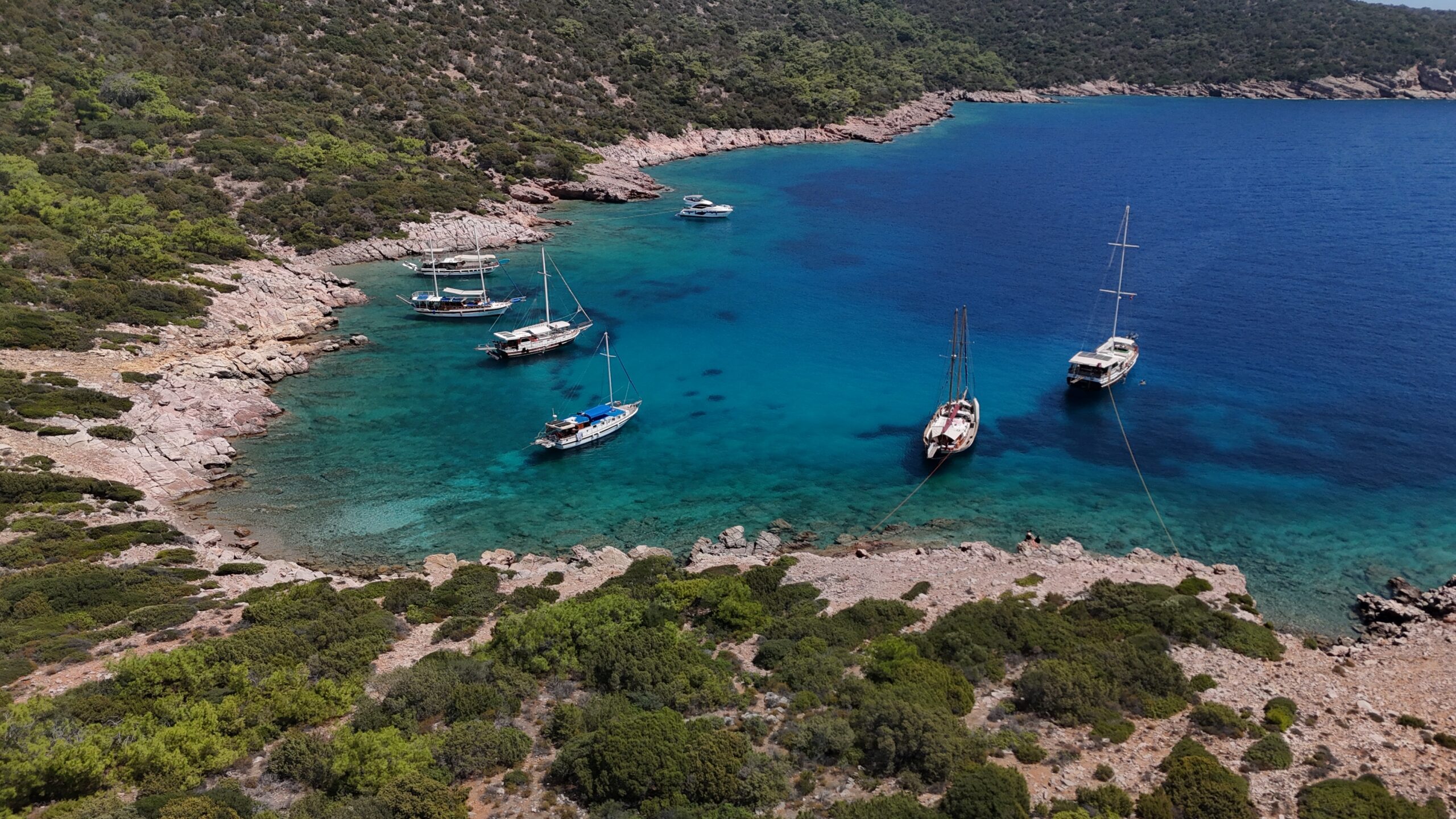 Sailing,Boats,Anchored,In,Turquoise,Bay,Of,Kara,Ada,Island