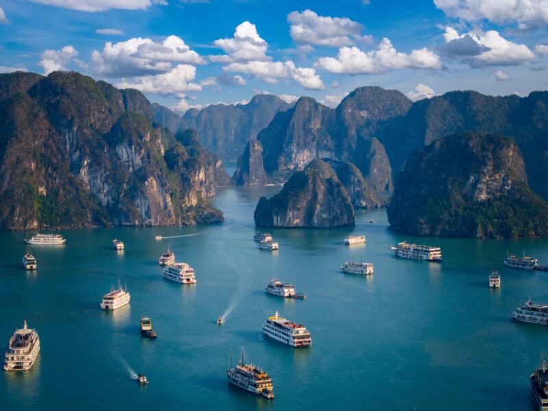 Aerial,View,Halong,Bay,With,Boats,Amongst,Limestone,Islands,In